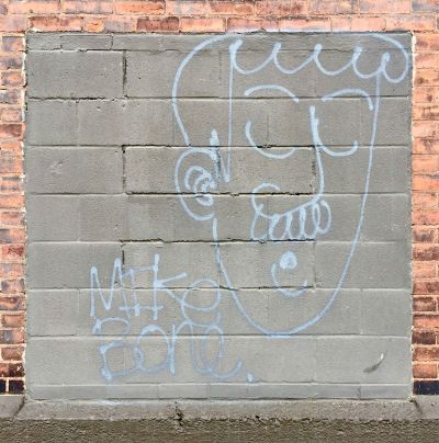 graffiti image of man with mustache on cinderblock wall, Pittsburgh, PA