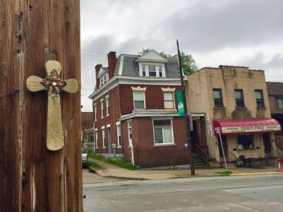 wooden cross attached to utility pole, Pittsburgh