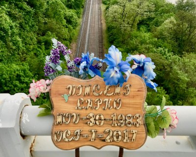 wooden memorial plaque with flowers for Vincent Lapko, Pittsburgh, PA