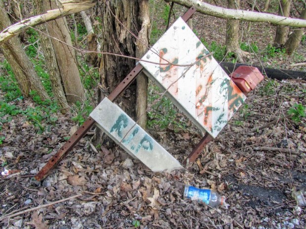 road construction warning sign turned into memeorial