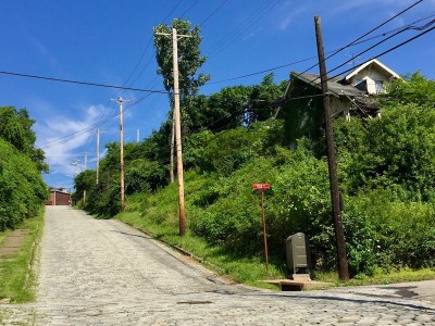 steep Belgian block residential street in Duquesne, PA