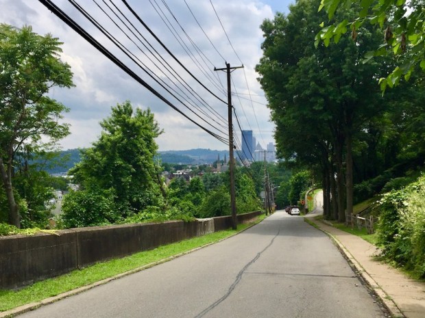 empty street with distant view to downtown Pittsburgh, PA