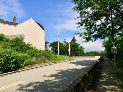 two-lane hillside road with house, Pittsburgh, PA