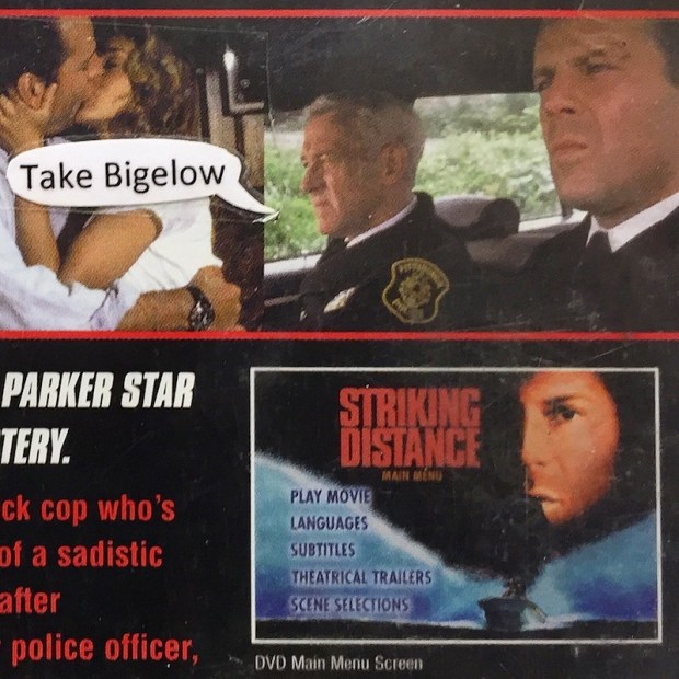 detail of "Striking Distance" DVD case with "Take Bigelow" word balloon taped onto outside