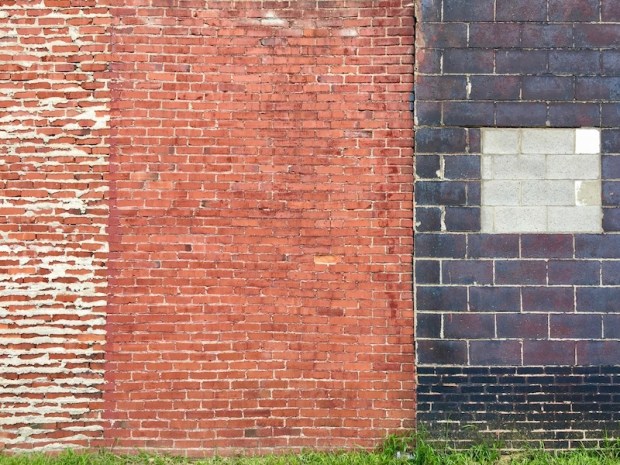 exterior wall built in multiple styles of brick and cinderblock, Clairton, PA