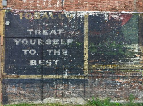 brick with layers of "ghost signs" overlapping, Clairton, PA