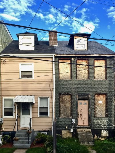 pair of row houses with very different exteriors, Pittsburgh, PA