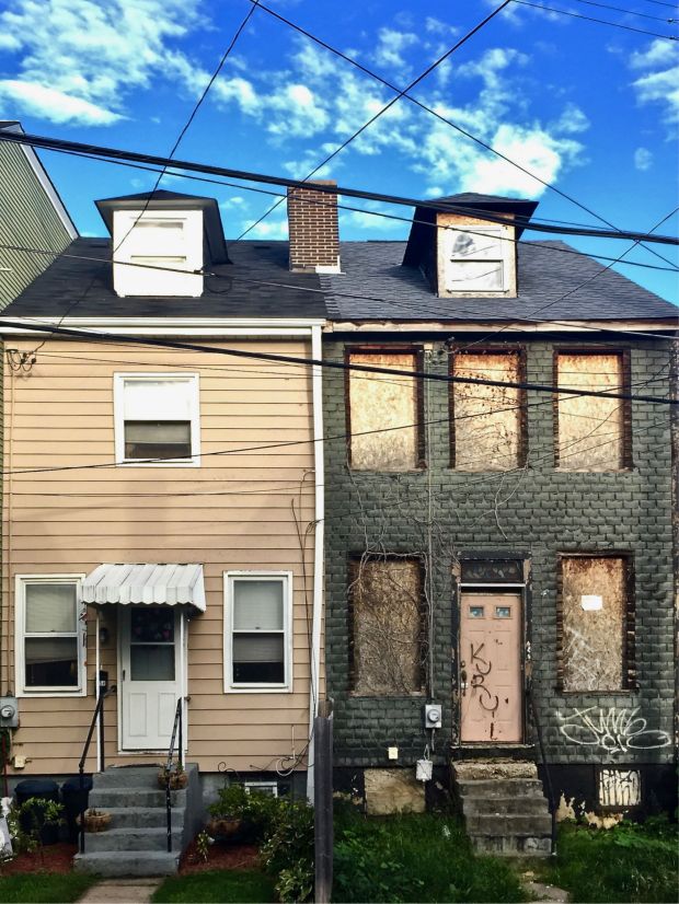pair of row houses with very different exteriors, Pittsburgh, PA