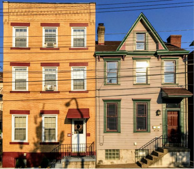 3-story brick townhouse adjoining 2-story frame row house, Pittsburgh, PA