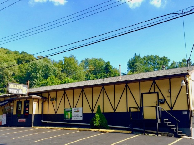 exterior of roadhouse bar painted black and gold, McKeesport, PA