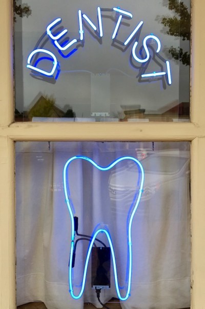 neon sign with large tooth for Beaver Dental Arts, Beaver, PA