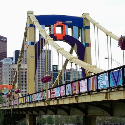 Andy Warhol Bridge in downtown Pittsburgh decorated with colorful knit panels