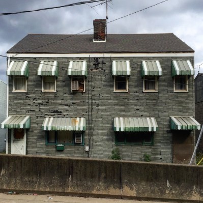 exterior of dilapidated row houses in Sharpsburg, PA
