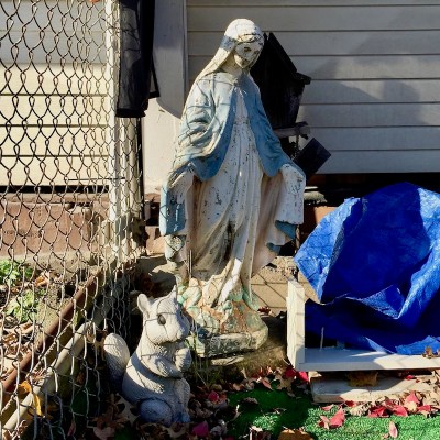 statuette of Mary in front yard of row house, McKees Rocks, PA