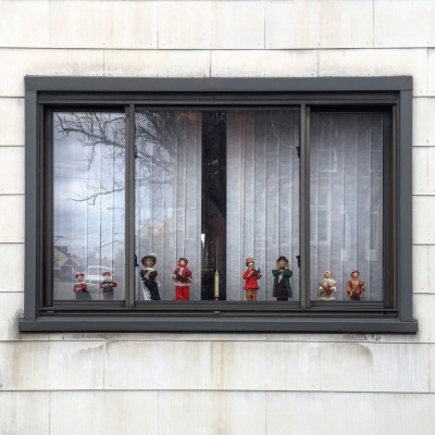 rowhouse window decorated for Christmas, Pittsburgh, PA