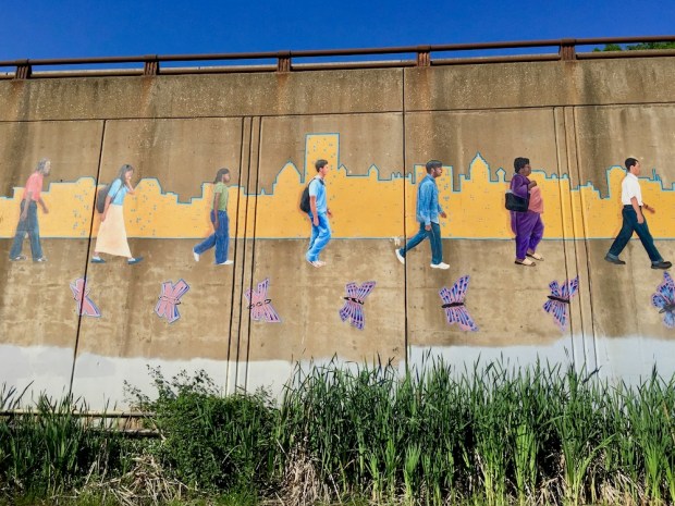 mural including the Pittsburgh skyline along bicycle trail