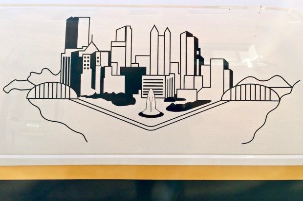 line drawing of Pittsburgh skyline on police van