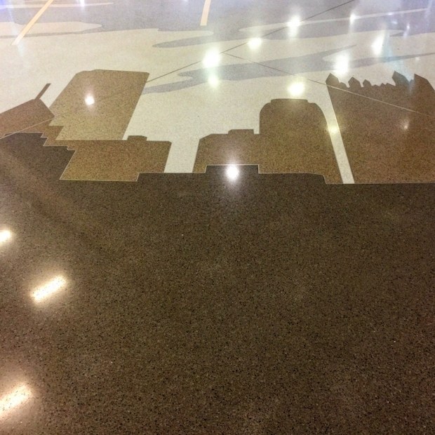 terrazzo tile floor of Pittsburgh International Airport with rendering of Pittsburgh skyline
