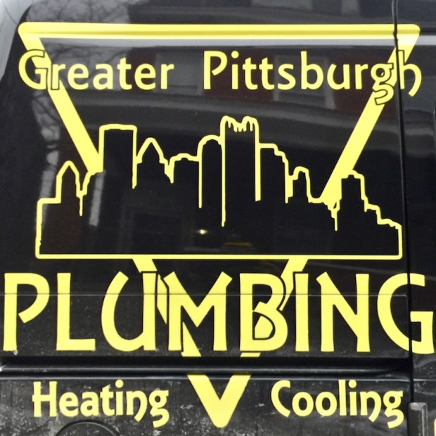 service van for Greater Pittsburgh Plumbing, Heating, and Cooling with Pittsburgh skyline
