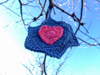 crochet Star of David with heart hanging from tree limb, Pittsburgh, PA