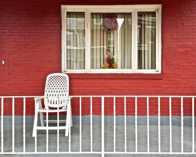 row house window decorated for Christmas, Pittsburgh, PA