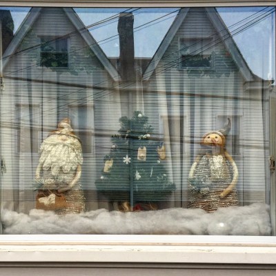 row house window decorated for Christmas, Pittsburgh, PA