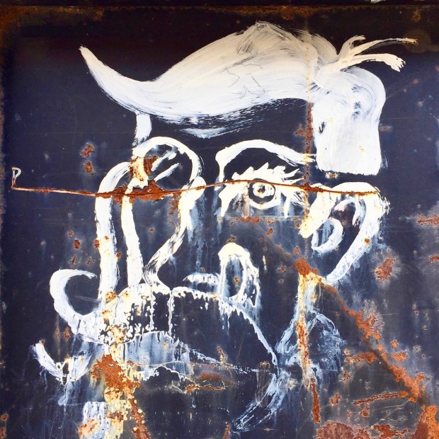 painting of man's face on dumpster, Pittsburgh, PA