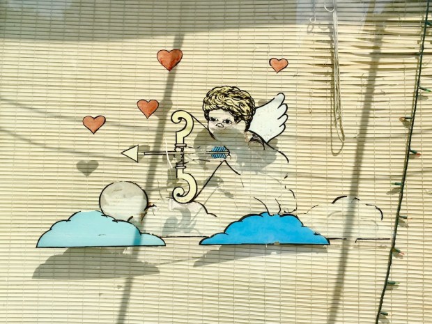 hand painted window image of Cupid in retail store front window, Clairton, PA