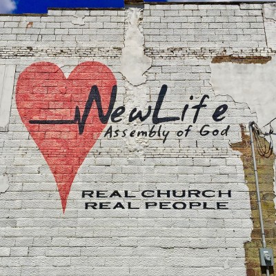 painted sign for New Life Assembly of God church on side of building, Brownsville, PA