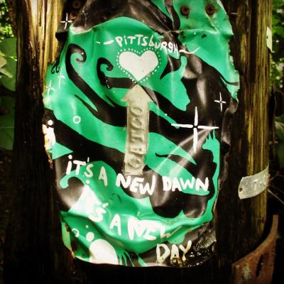 painted tin can with white heart nailed to utility pole, Pittsburgh, PA