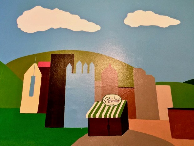 colorful mural featuring the Pittsburgh skyline