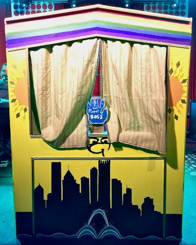 handmade puppet stage decorated with Pittsburgh skyline