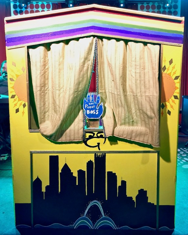 handmade puppet stage decorated with Pittsburgh skyline