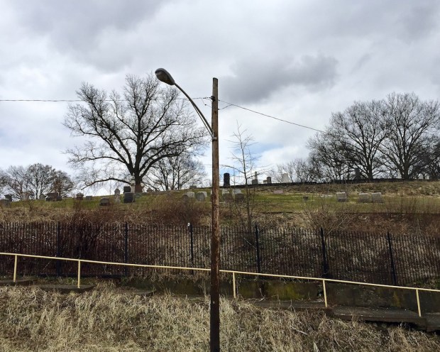 public steps on sidewalk with hillside cemetery above, Pittsburgh, PA
