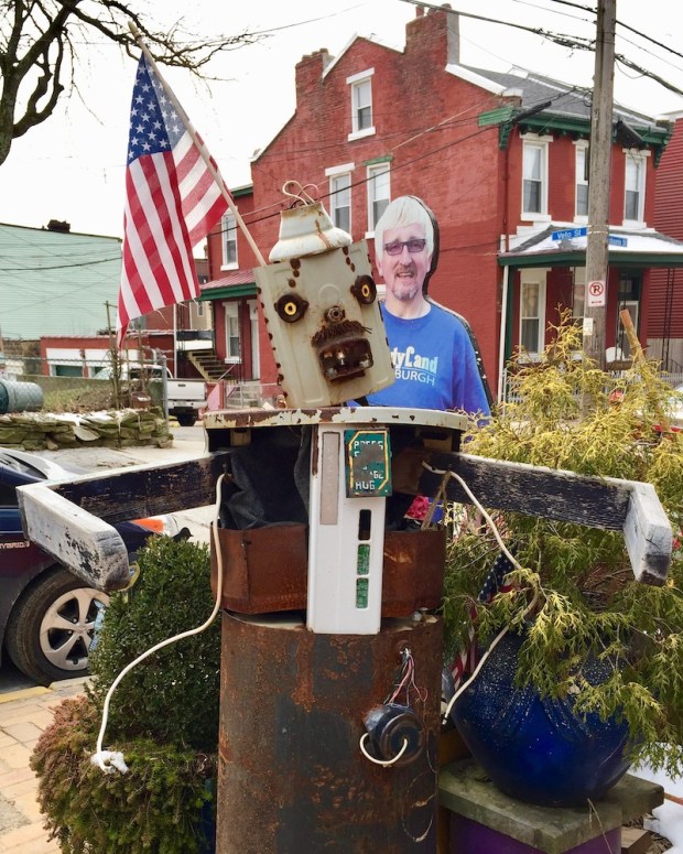 art robot with outstretched arms