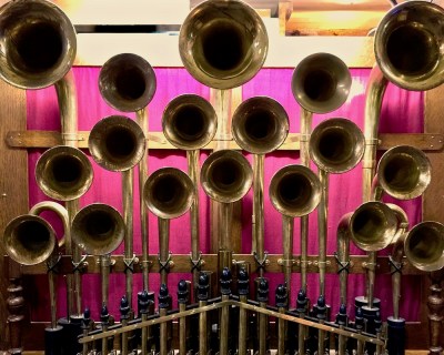 brass horns attached to elaborate band organ at DeBence Antique Music World