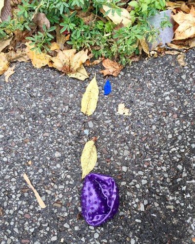 deflated toy ball left on street