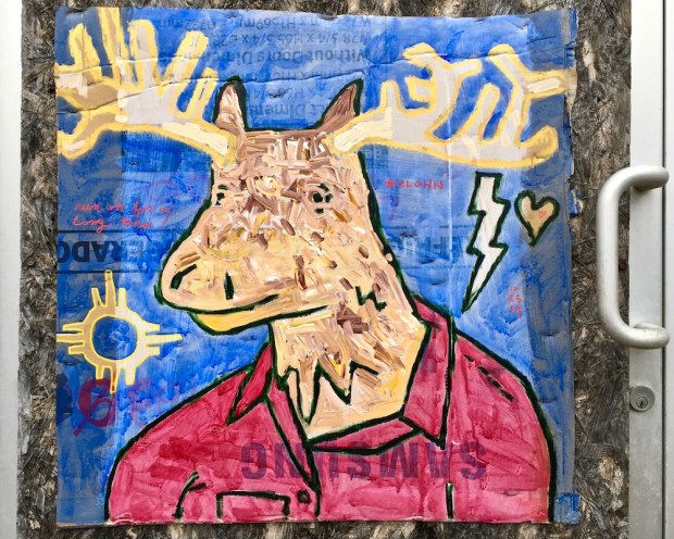 street art painting of deer with large antlers on cardboard