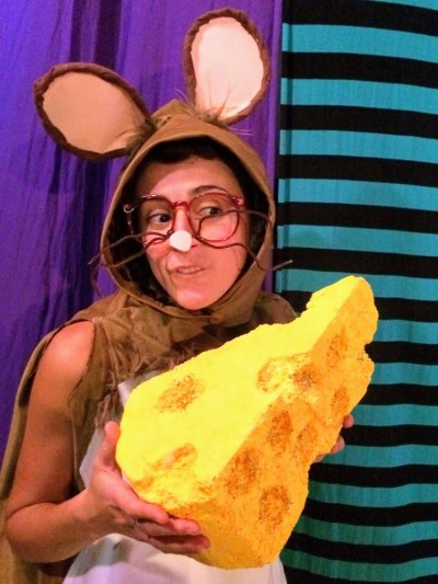 actress dressed as mouse with large piece of cheese