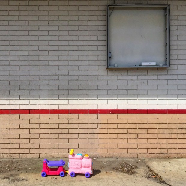 riding/rolling toy abandoned at former quick mart