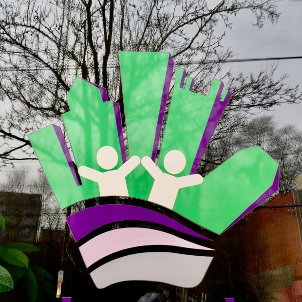 logo for Pittsburgh Cares with caricature of the Pittsburgh skyline as fingers in a hand