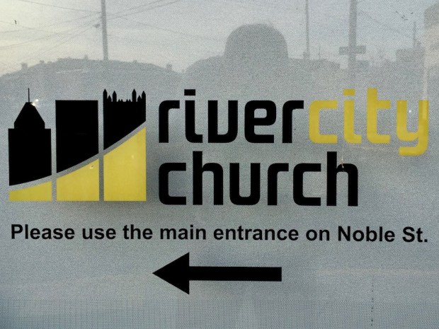 black and gold logo for River City Church with three iconic downtown Pittsburgh buildings in silhouette