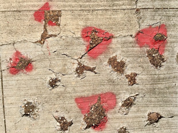 graffiti hearts painted on sidewalk