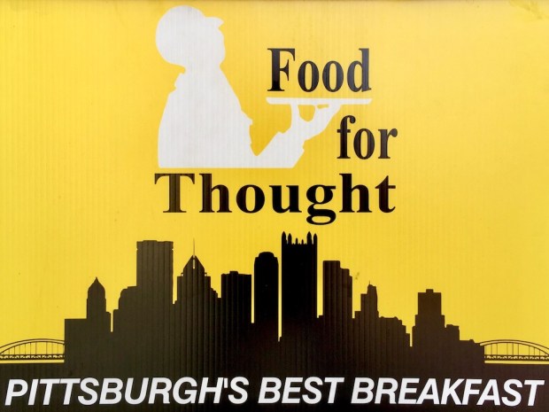 tent sign for For for Thought deli including the Pittsburgh skyline