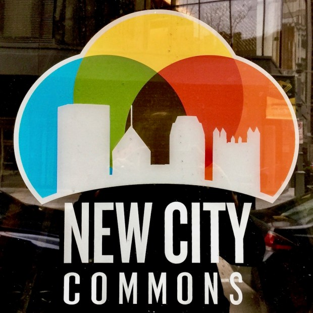 logo for New City Commons featuring silhouetted buildings from the Pittsburgh skyline