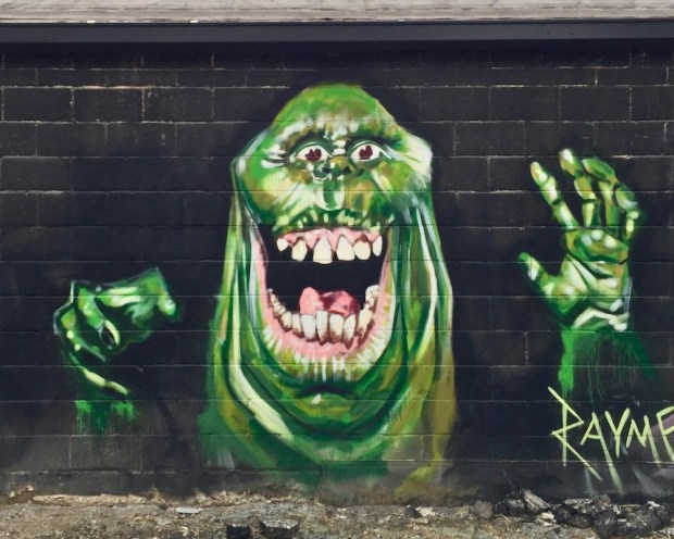 mural of green monster by artist Jeremy Raymer