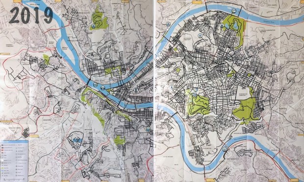 paper map of Pittsburgh with lines drawn to mark all streets walked