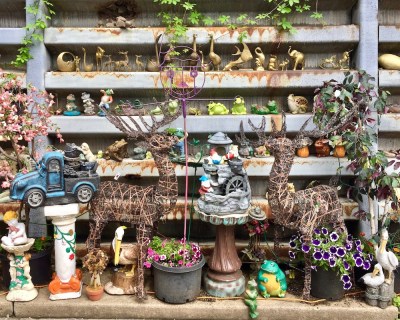 retaining wall with many model animal figures