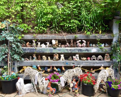 retaining wall with many model animal figures