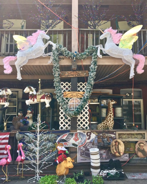 back porches of row house with elaborate decorations
